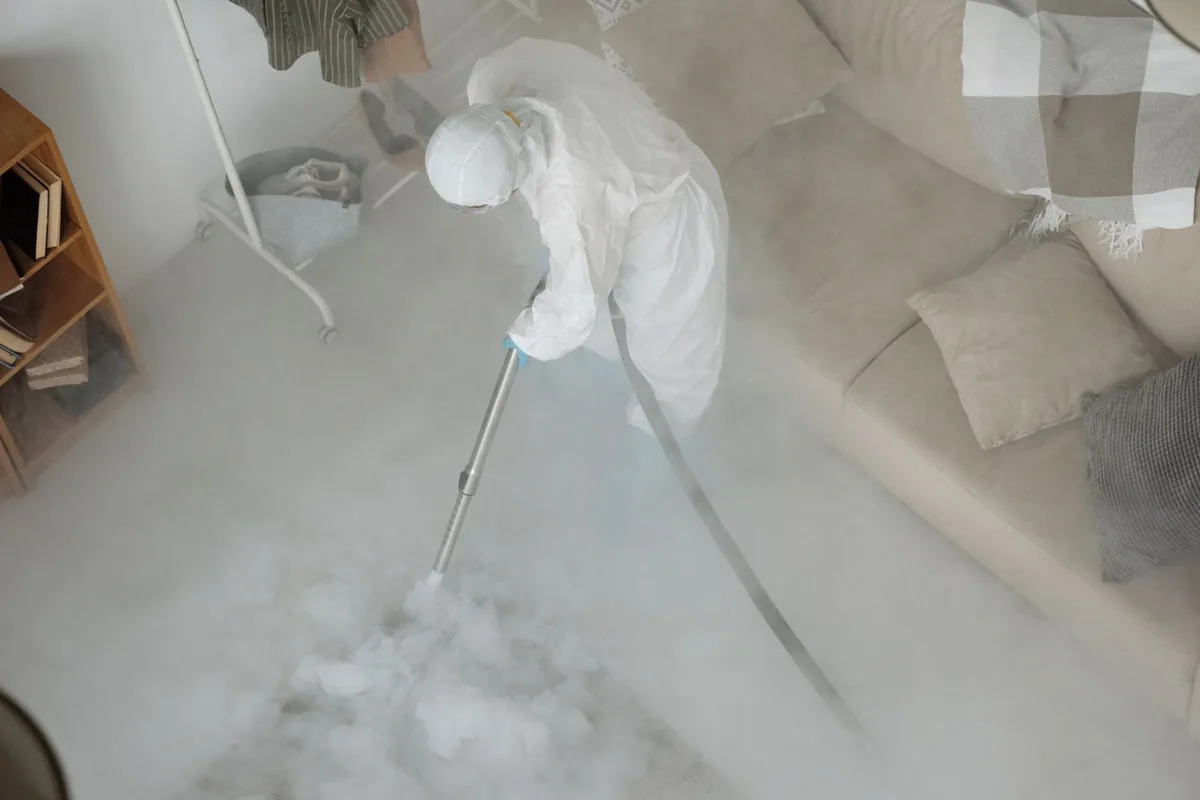 Biohazard cleanup technician in protective equipment, Gallatin, TN